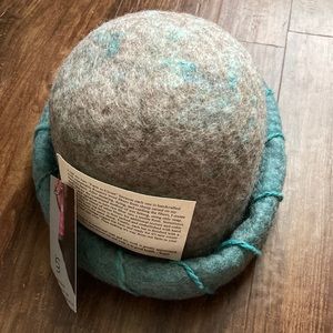 Bowler style hat, wool, turquoise blue and grey.
